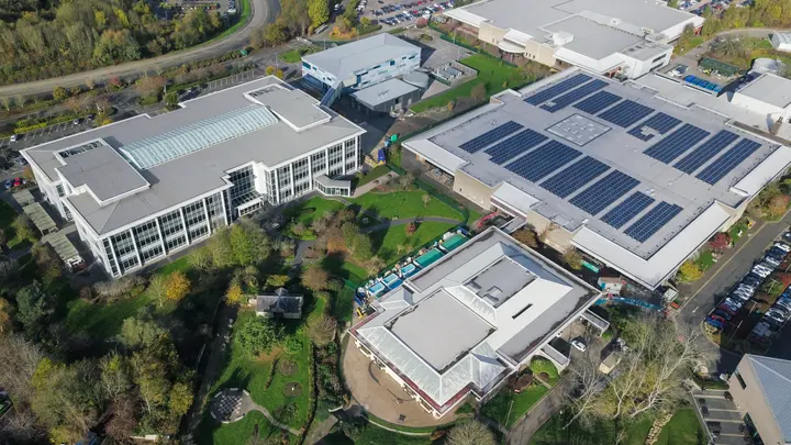 Aerial view of rooftop solar on an industrial facility in Kottayam